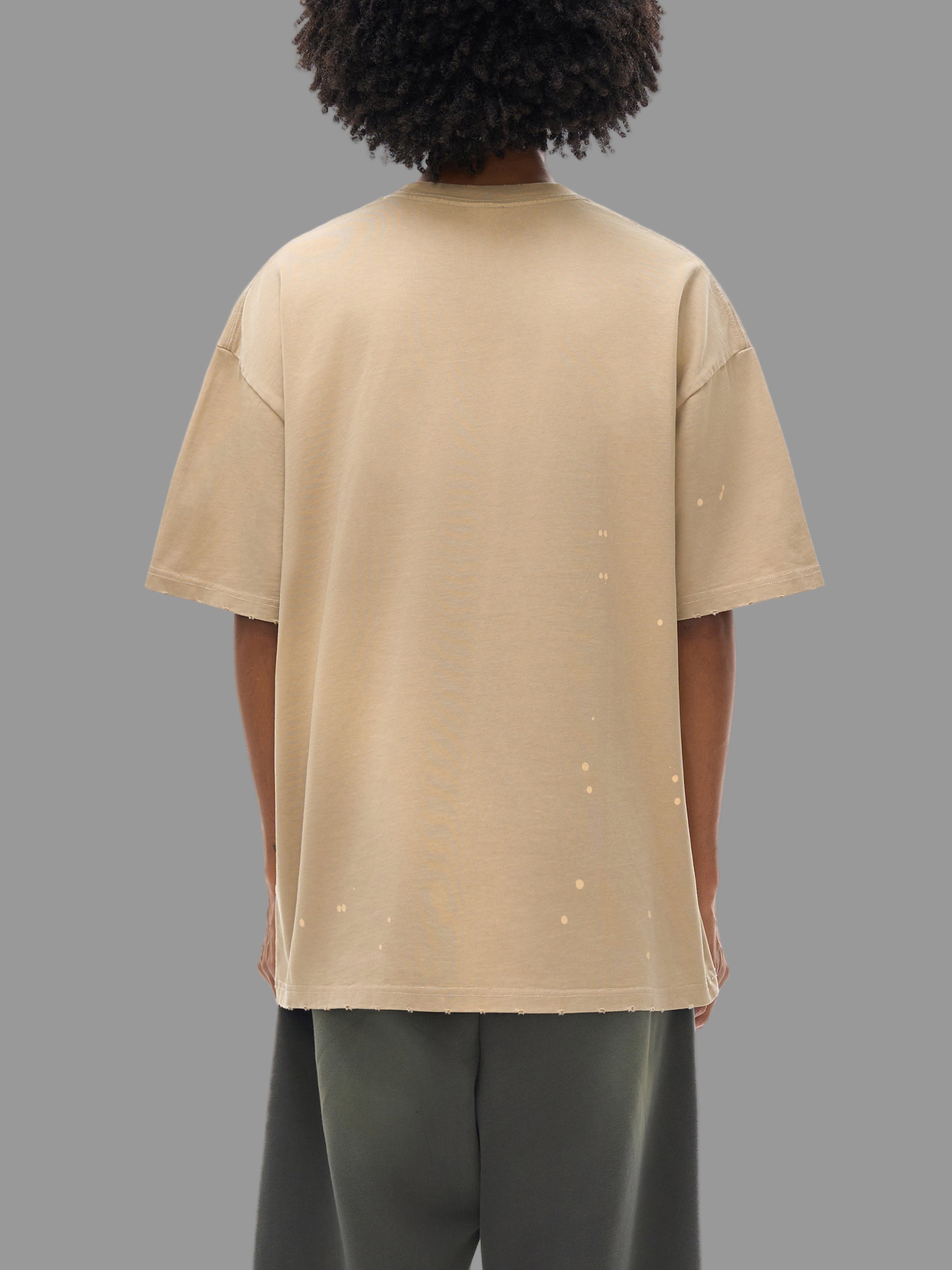 T-shirt à effet délavé et effiloché à la main