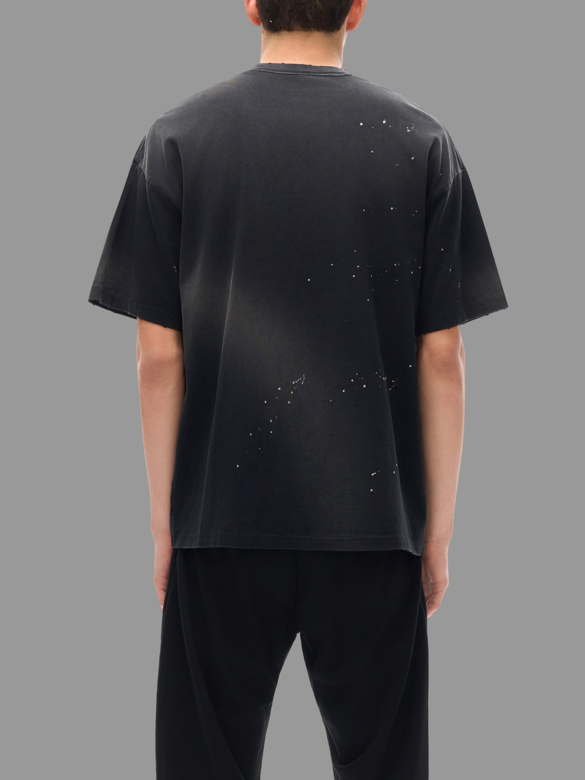 T-shirt à effet délavé et effiloché à la main