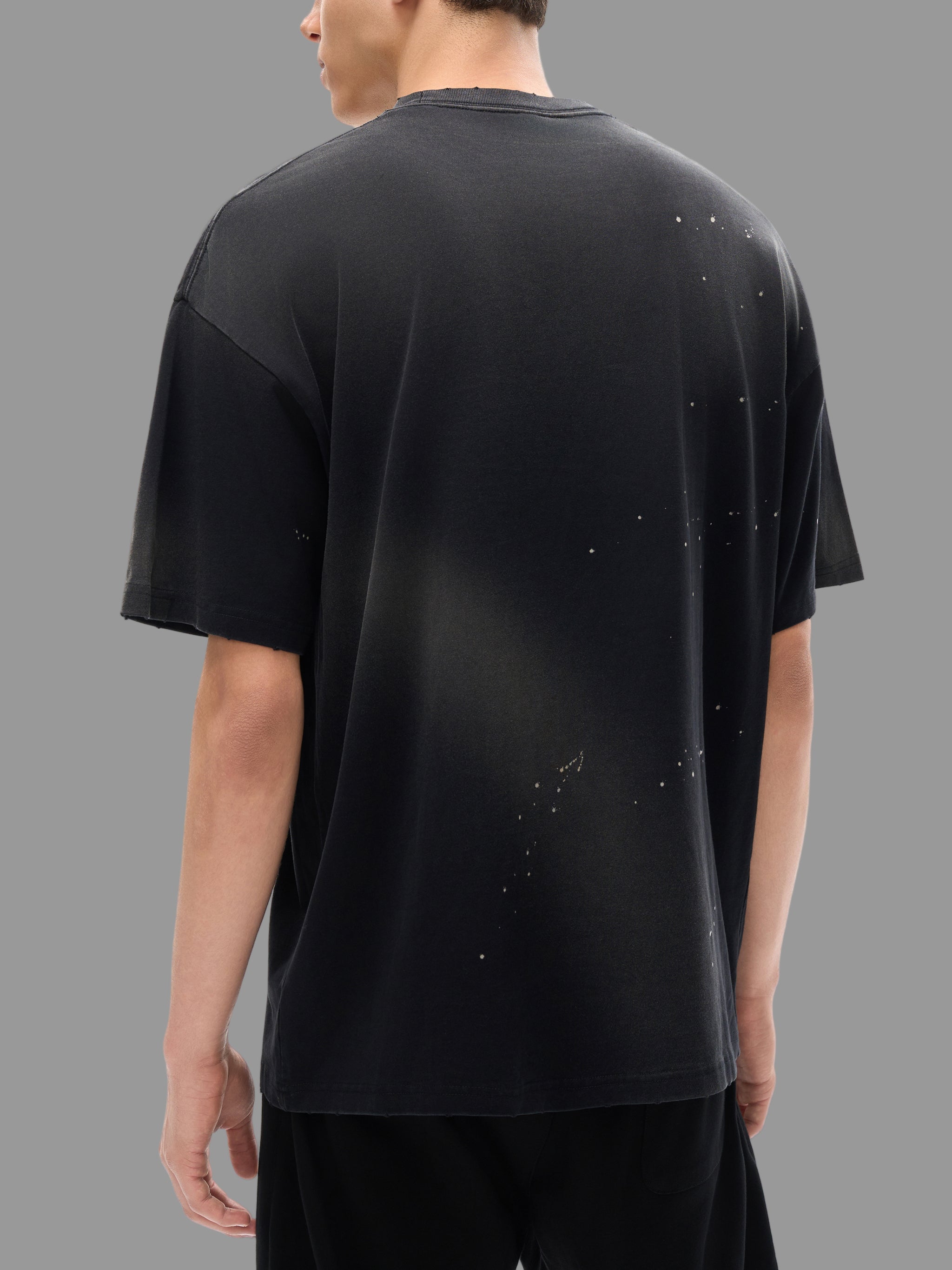 T-shirt à effet délavé et effiloché à la main