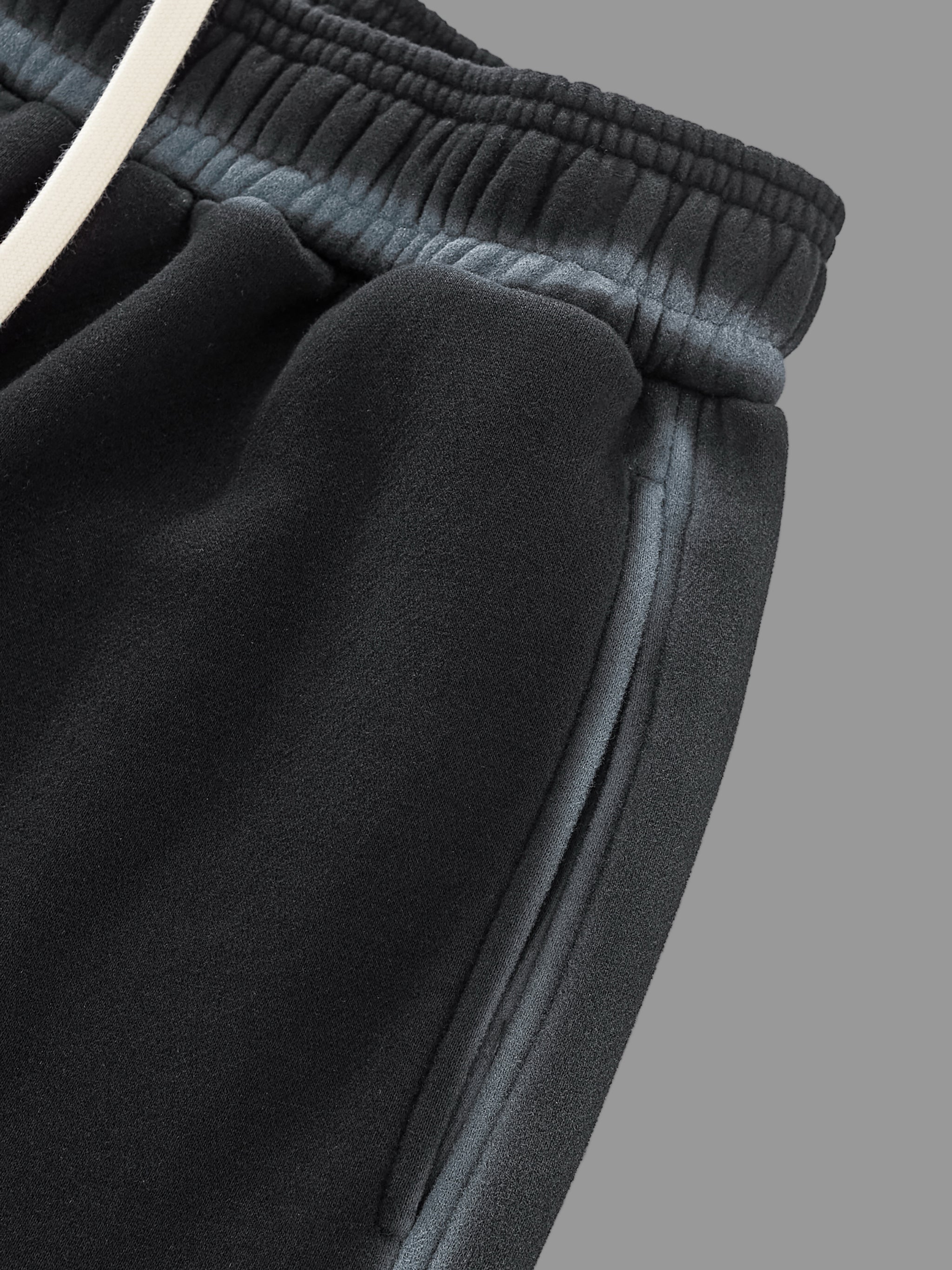 Pantalon de survêtement en polaire à bords délavés