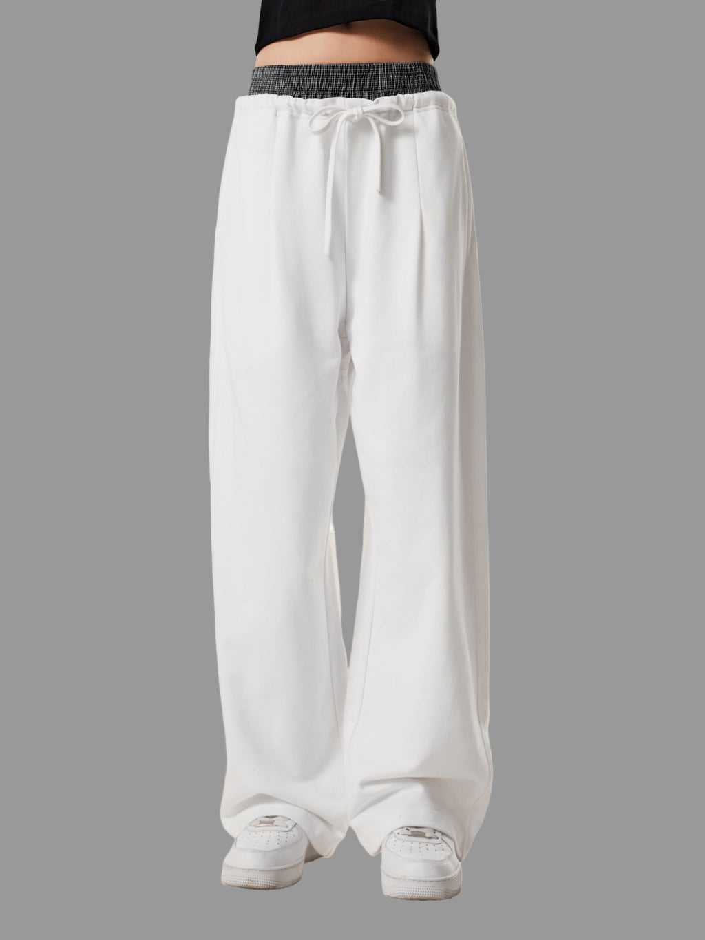 Pantalon à carreaux à taille contrastée