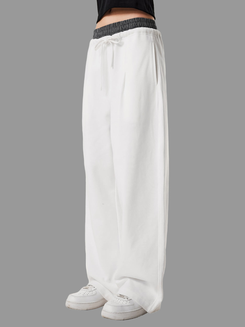 Pantalon à carreaux à taille contrastée