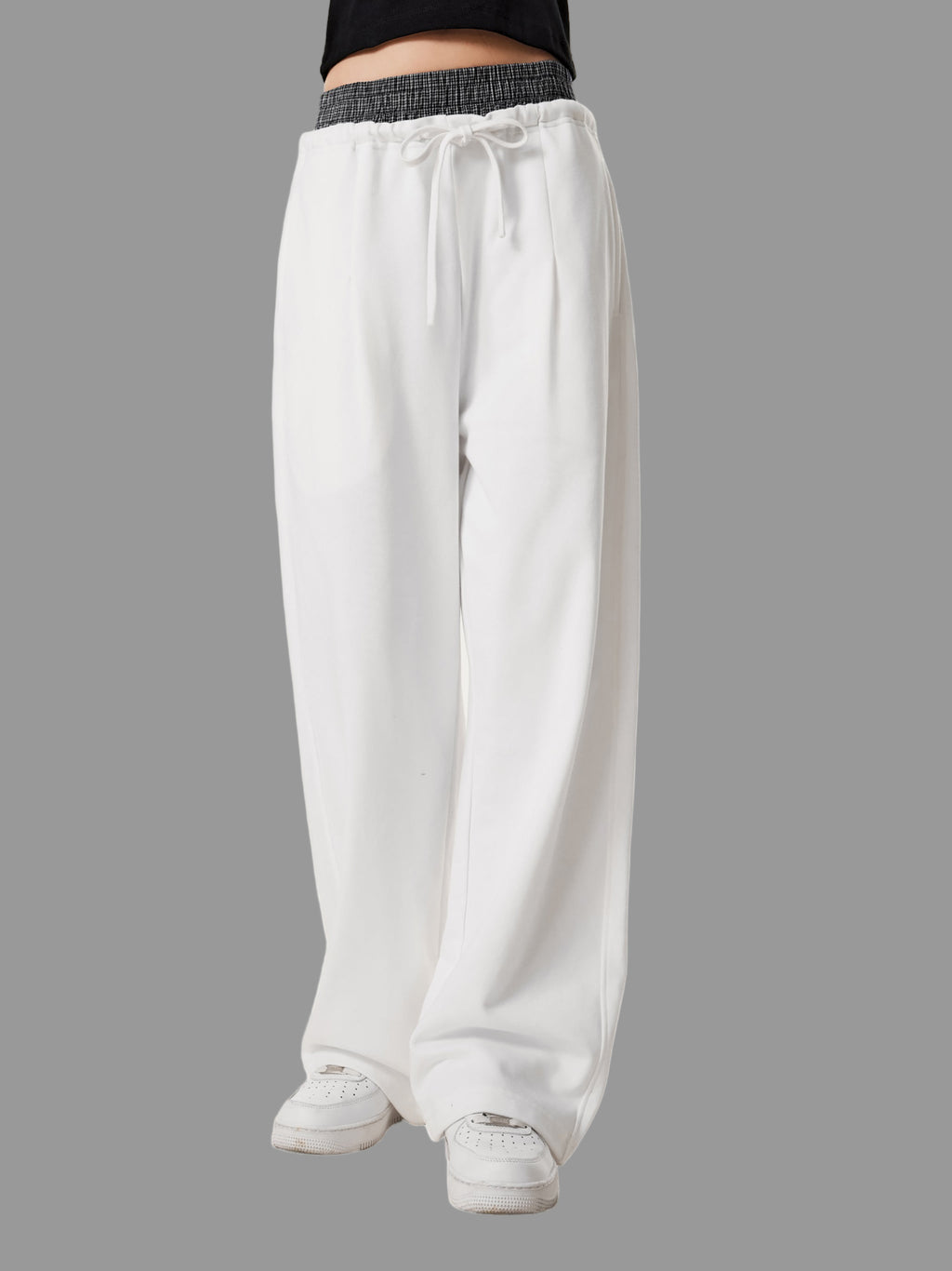 Pantalon à carreaux à taille contrastée